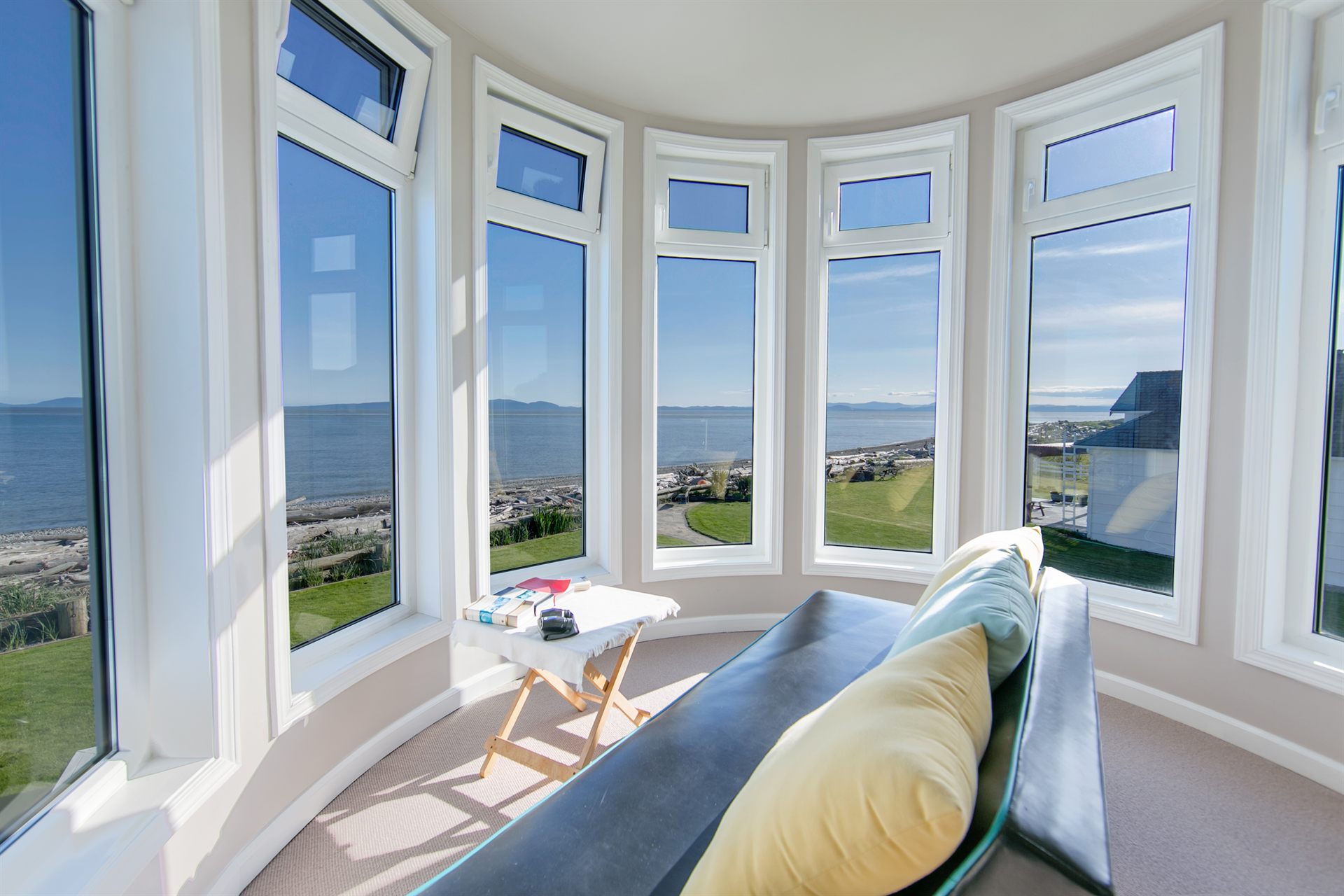 Bay window sitting room overlooking the water in a Whatcom County waterfront home