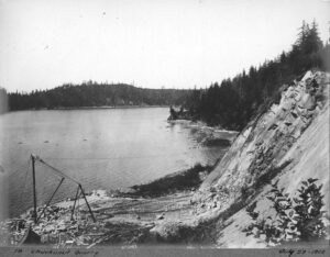 Exposed sandstone quarry face with cut stone blocks, 1900