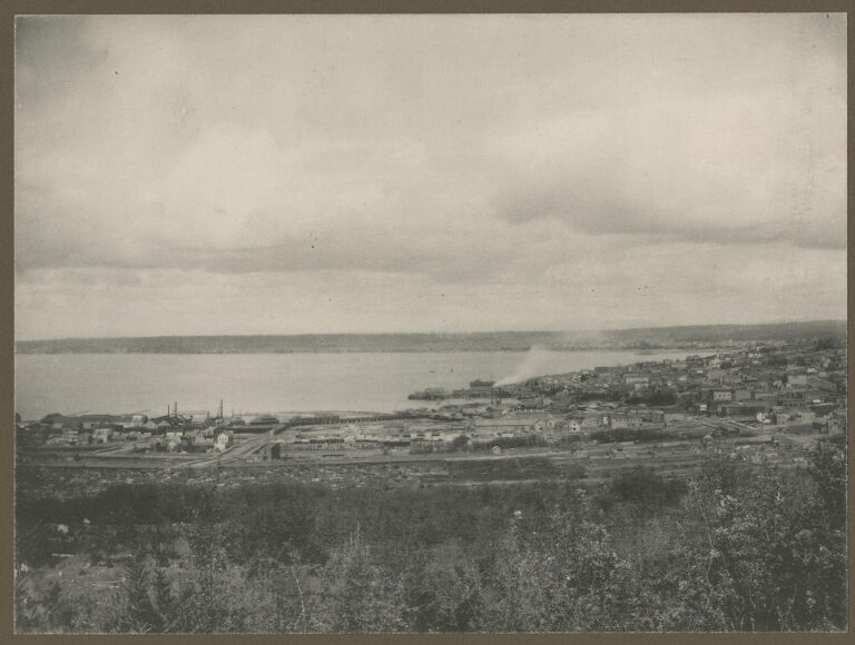 An elevated 1900 view over the Fairhaven waterfront and piers on Bellingham Bay