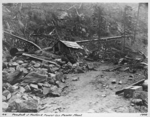 A large wooden penstock pipe feeding the Nooksack Power Company plant, 1902