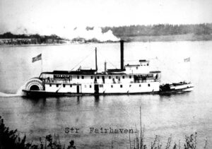 A vintage sternwheel steamboat named Fairhaven underway on Puget Sound