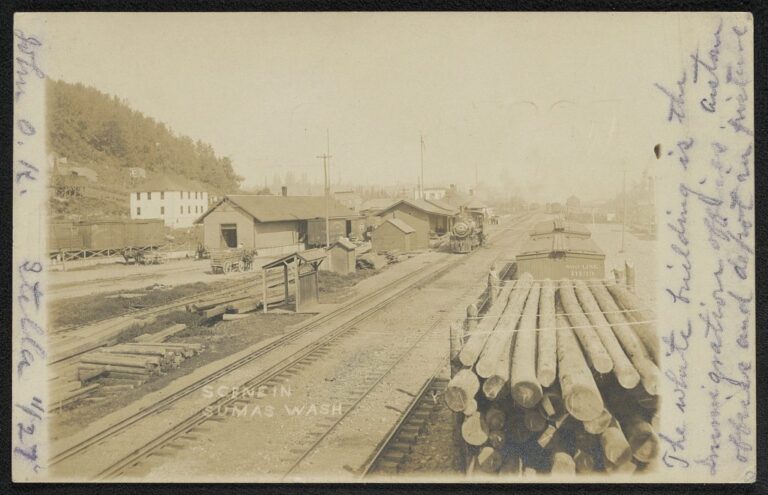 Black and white street scene in Sumas, Washington around 1907 with wooden buildings