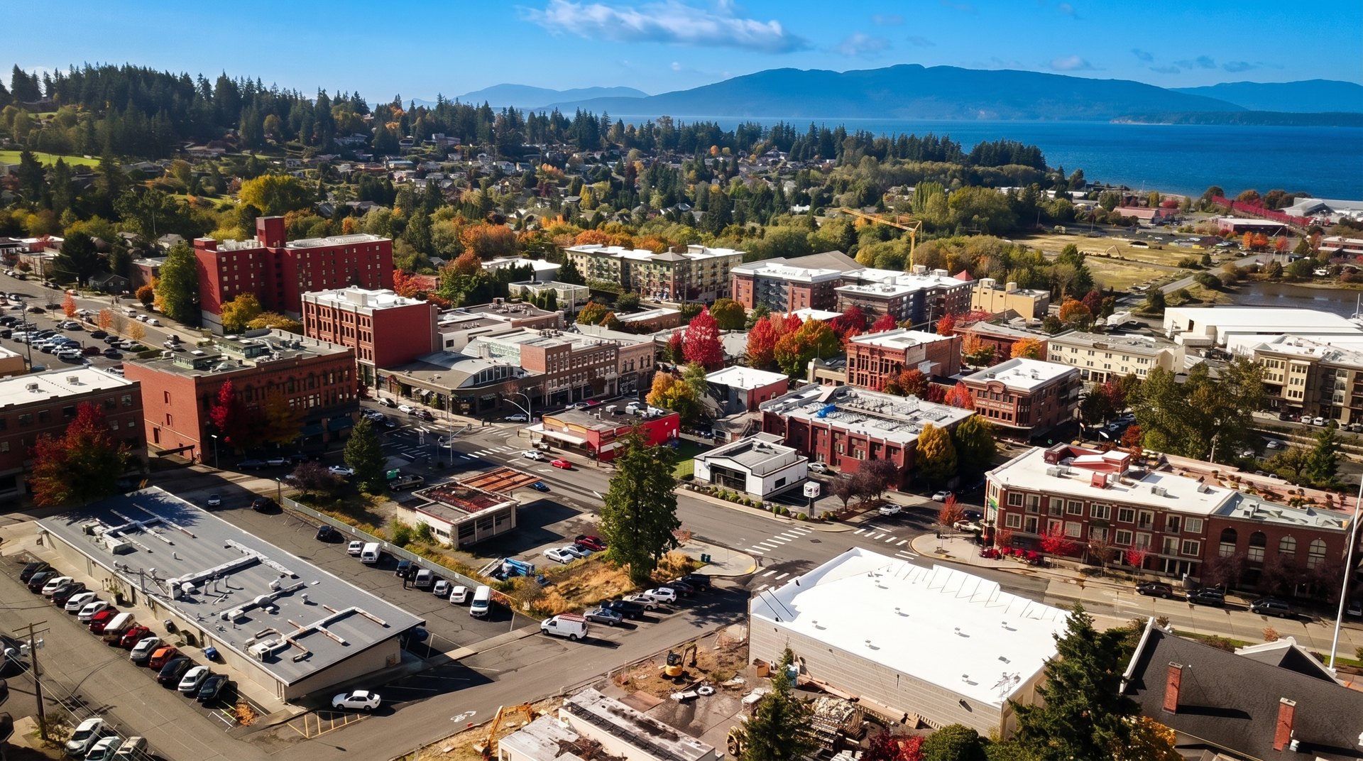 Historic walkable Bellingham waterfront district at sunset with marina and mountains