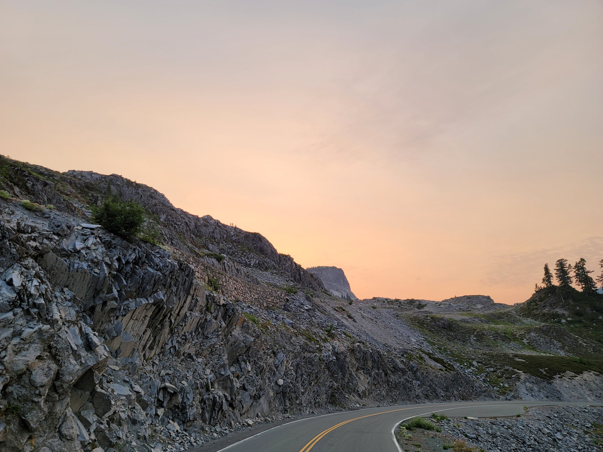 The Mt Baker Highway ending at the Artist Point parking lot under a pastel sunset