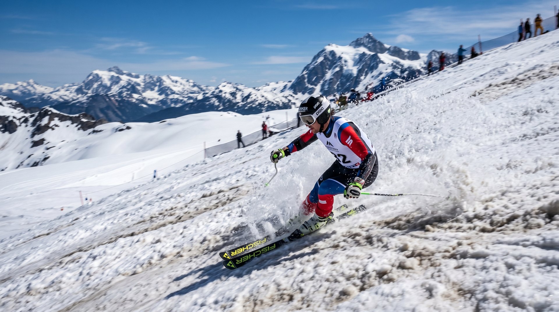 Downhill skier carving down a spring slope at Mt. Baker